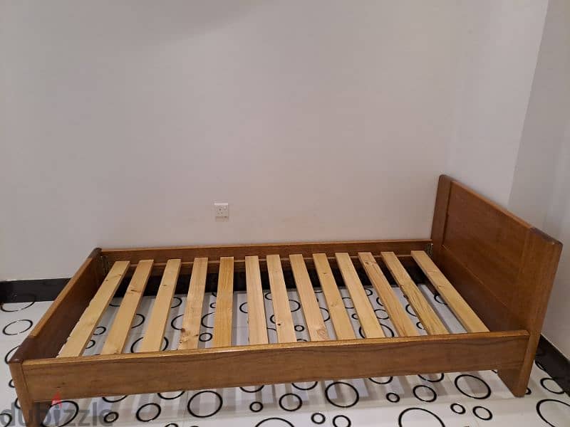 wooden single bed.   سرير خشبي مفرد 1