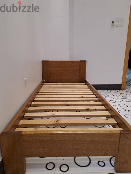 wooden single bed.   سرير خشبي مفرد 3