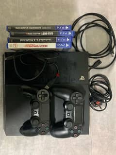 PlayStation 4 with 4 games and 1 controller