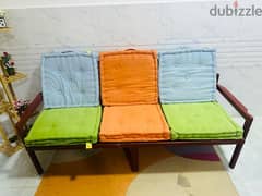 pure wooden sofa with cushions