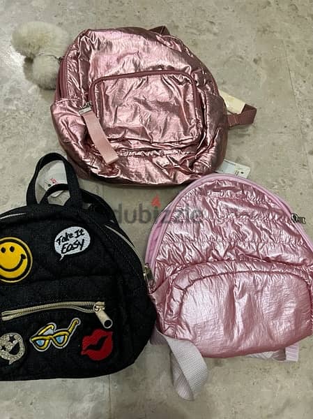 Trolley bag+3 back bags all 5 rials 1