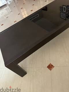 solid heavy wood coffee table in good condition