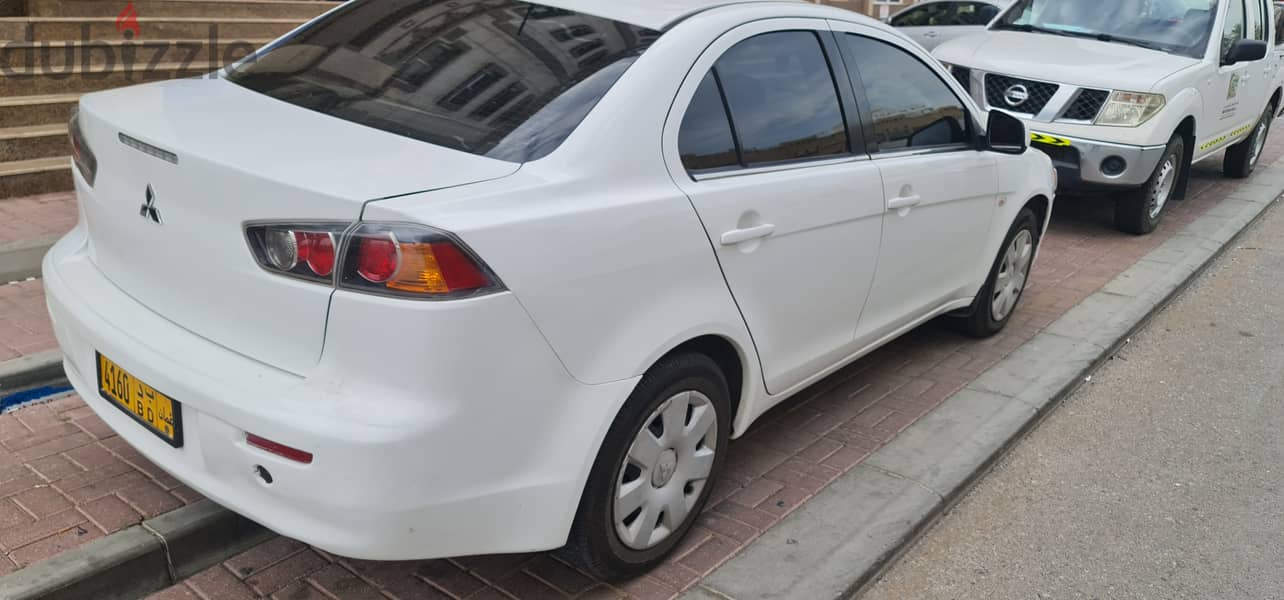 Lancer 2010 model ,very good condition, neat and clean 1
