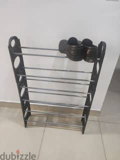 shoe rack. sparingly used