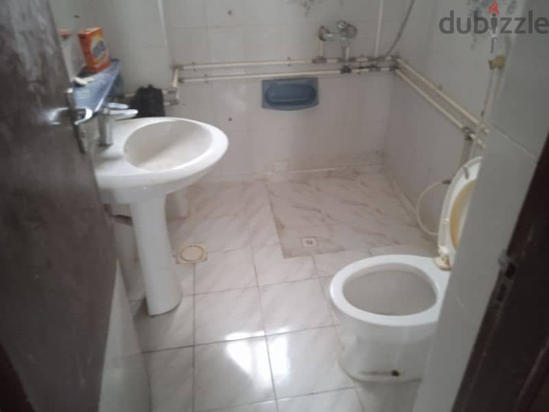 1 room with bathroom and kitchen sharing 1
