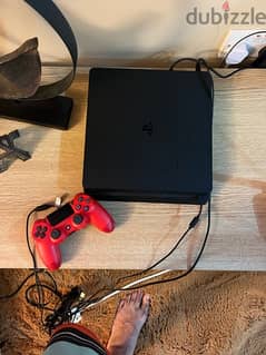 Play Station 4 console with controller
