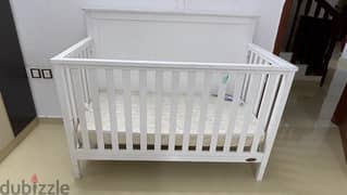 Baby shop wooden cot with babyshop bedding with Raha mattress