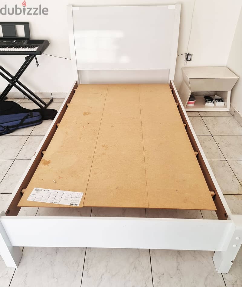 Sleek White Bed Frame - 4 Years Old and Well-Maintained 3