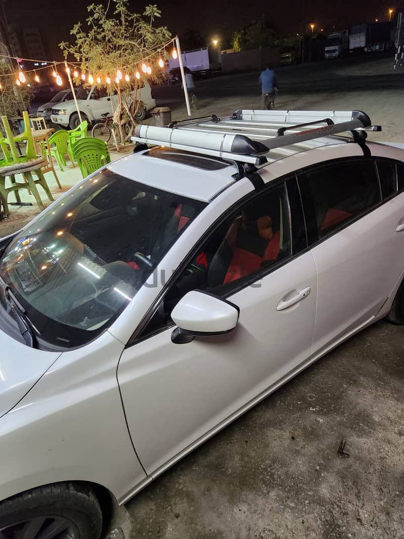 Universal roof rack/carrier with basket for sedan 3