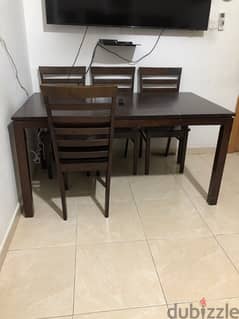 Dining Table with four chairs.