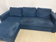 blue “L” shape sofa with storage