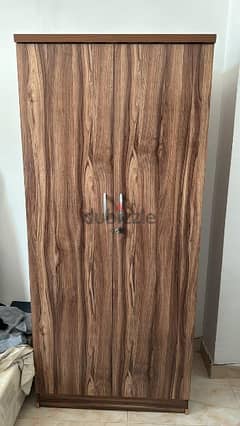 1 month used wooden cupboard and cot without matress