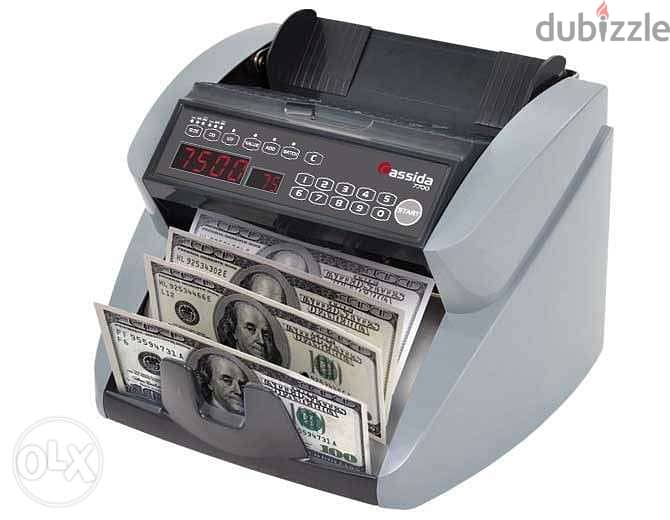 Currency counting machine. /آلة عد العملات. 3