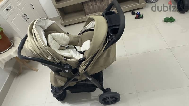 Joie baby stroller with car seat in good condition 1