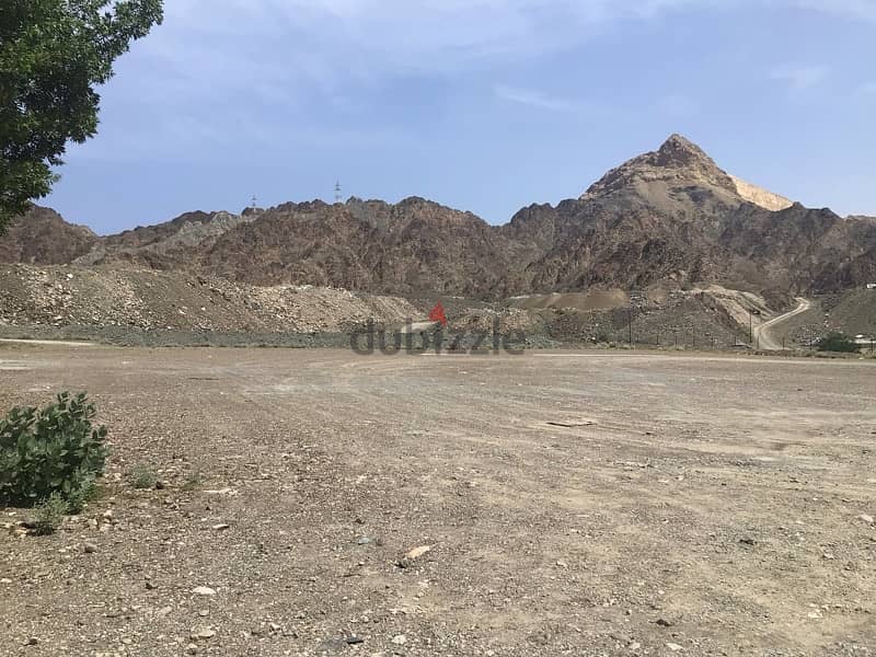 Commercial industrial land for rent /warehouse construct in wadi kabir 9