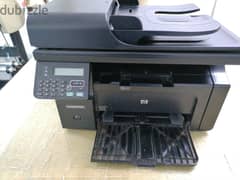 HP LaserJet Pro M1212nf Multifunction Printer 0