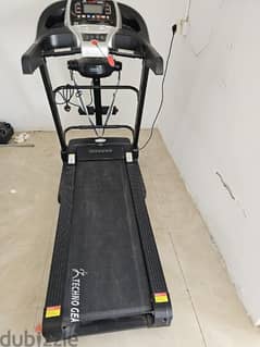 Treadmill with massager belt