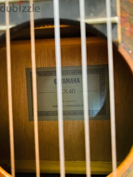 “Strum Away: Yamaha Box Guitar - Your Musical Journey Begins Here!” 3