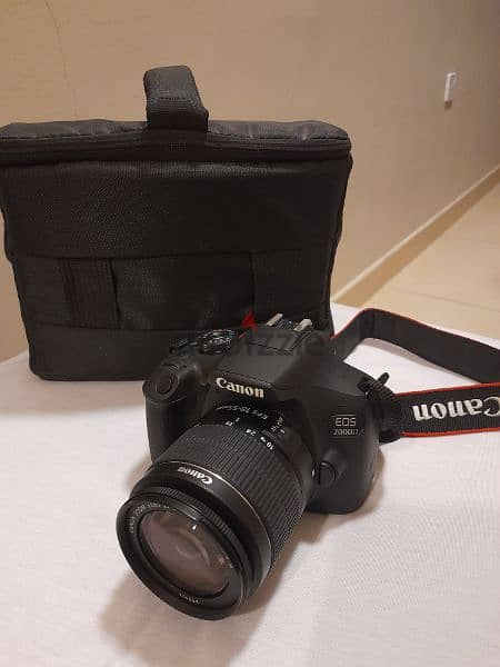 Canon DSLR 2000D Camera, EF-S 18-55 III kit
+ Promage Camera Tripod 3