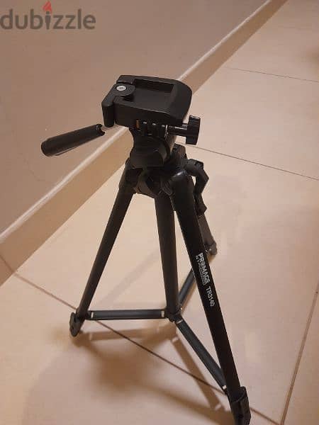 Canon DSLR 2000D Camera, EF-S 18-55 III kit
+ Promage Camera Tripod 7