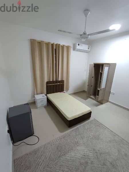 room for rent in alkhoud 7 all amenities are free 7