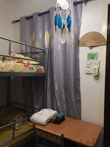 Tiny room with attached toilet for rent- only 1 lady 6