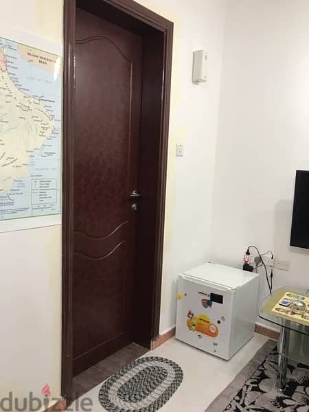 Tiny room with attached toilet for rent- only 1 lady 10