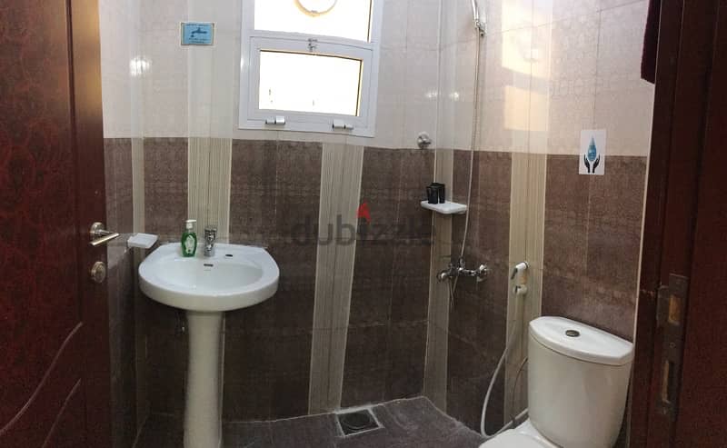 Tiny room with attached toilet for rent- only 1 lady 11