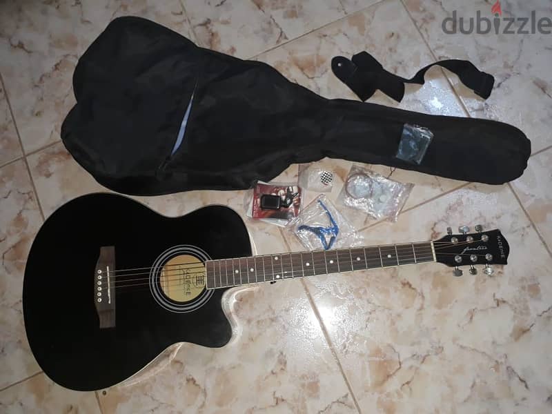 Black acoustic guitar 1