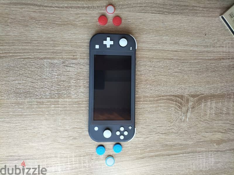 Nintendo switch lite and accessories (good condition) 2