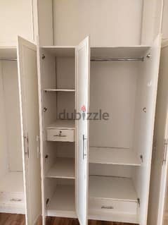 wardrobe , dressing table, side table, bed 0