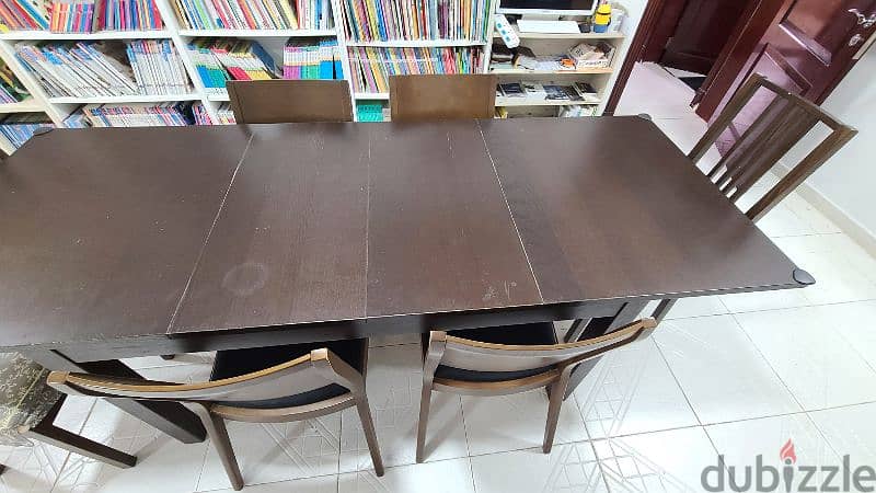 Good dining table and 7 chairs, 90 omr 3