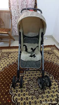 branded baby stroller with car seat+ baby carrier bag  good condition.