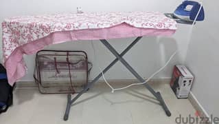 ironing board,cloth drying stand and laundry basket