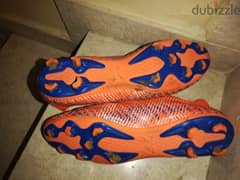 nivia  football boots with studs blue n orange (laces) 0