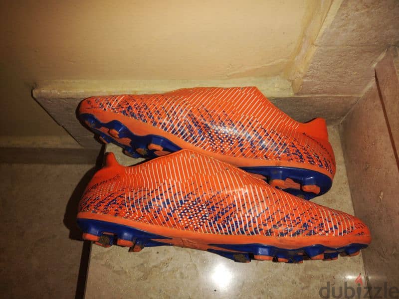 nivia  football boots with studs blue n orange (laces) 2