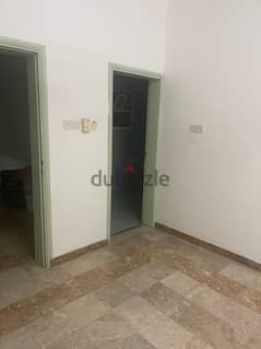There is a room with bathroom for rent in Al Khuwair