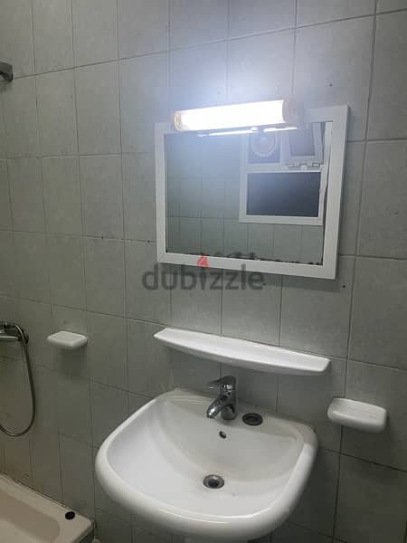 There is a room with bathroom for rent in Al Khuwair 4