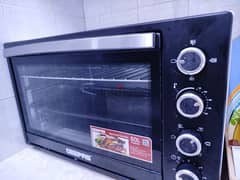microwave oven , toaster, griller