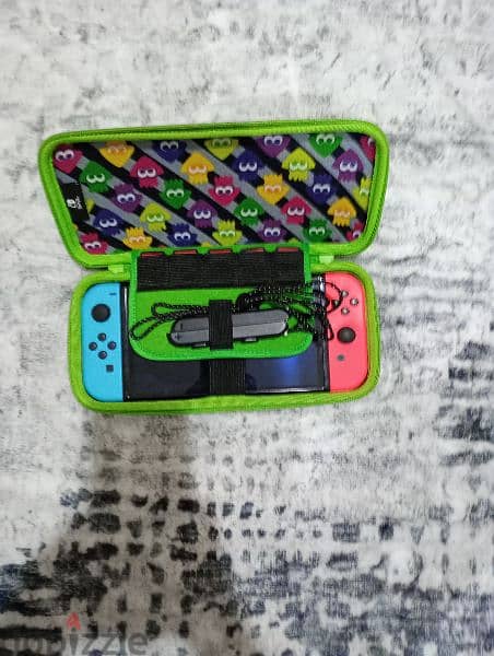 Nintendo switch OLED with controller, case and 5 games 5