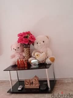 table with decoration items teddy bear