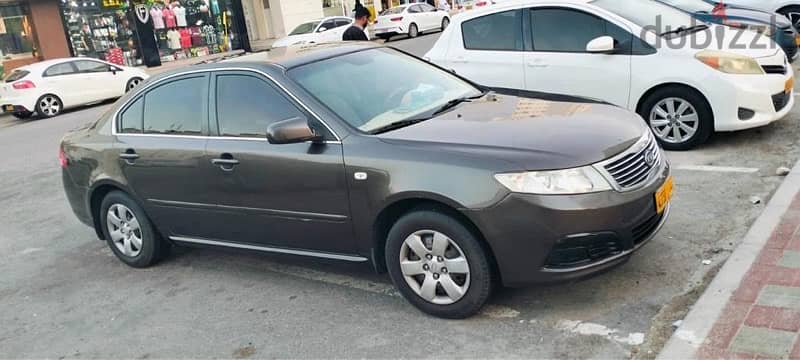 Looking for sale Kia optima 2009 model neat and clean 9