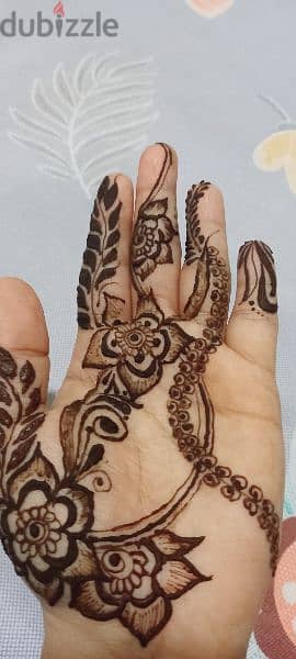henna artist . . . 1