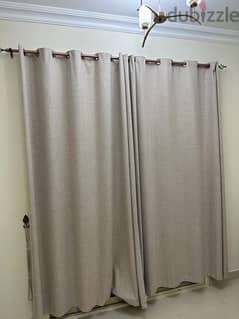 beige curtain with rail and holder 0