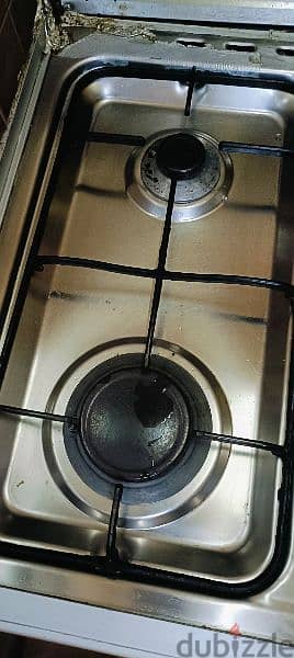 Cooking range. . . Oven maintenance required. . Slightly damaged. . . 4