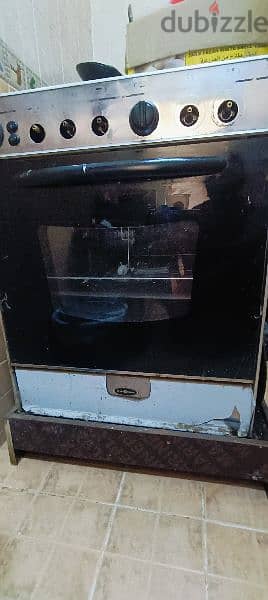 Cooking range. . . Oven maintenance required. . Slightly damaged. . . 5
