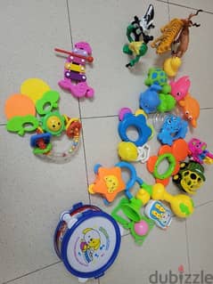 Beach toys,  balls and rattles and teethers