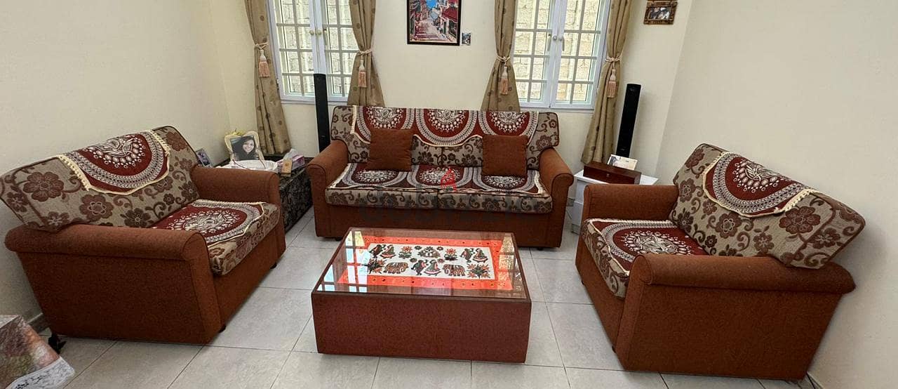 Sofa set 5 seated (3+1+1)with the center table in very good condition 1