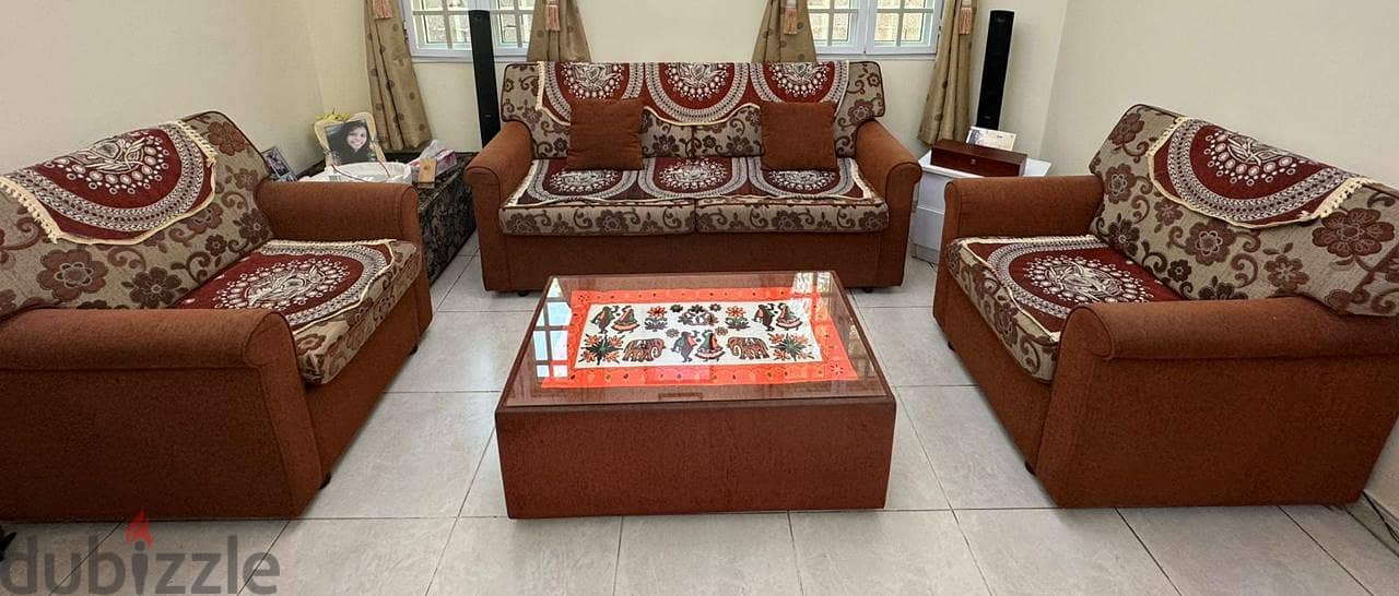 Sofa set 5 seated (3+1+1)with the center table in very good condition 2