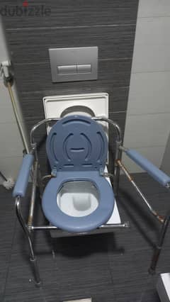 Toilet chair for people with difficulty  in sitting  down at toilets